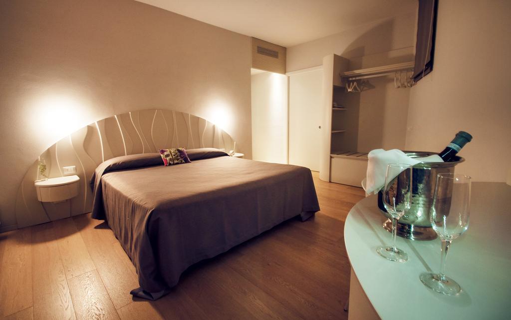 Aromi Piccolo Hotel Saló Habitación foto