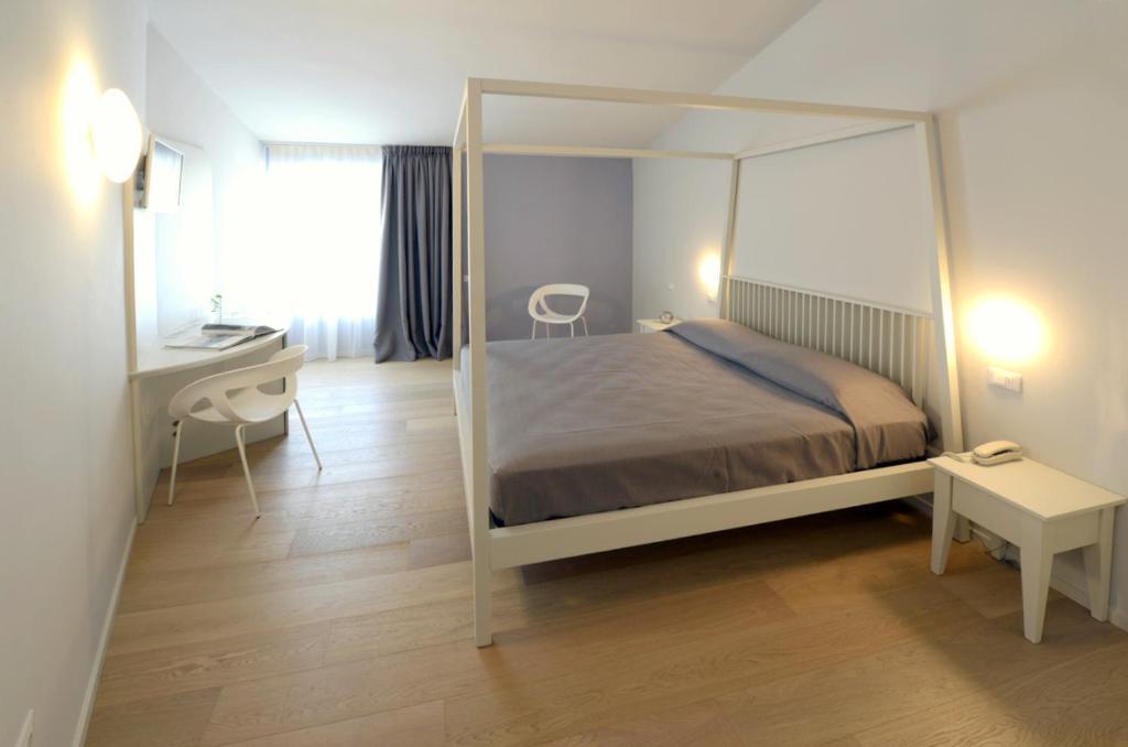 Aromi Piccolo Hotel Saló Habitación foto