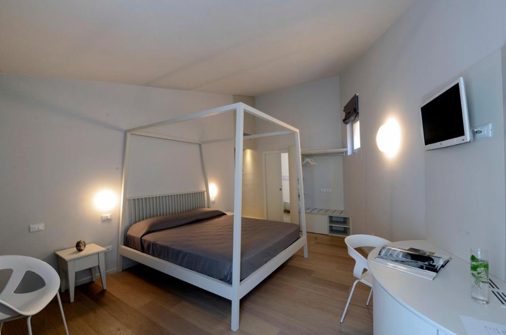 Aromi Piccolo Hotel Saló Habitación foto